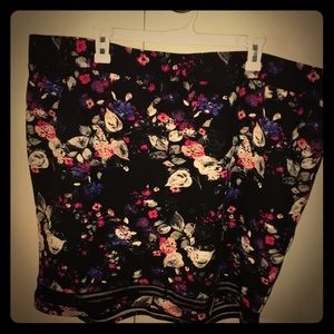 Torrid brand, black floral mini skirt.